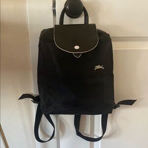 Longchamp Le Pliage Backpack with Adjustable Straps and Flap Closure